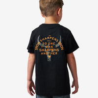 Child wearing a black t-shirt with text and graphic on the back against a white background
