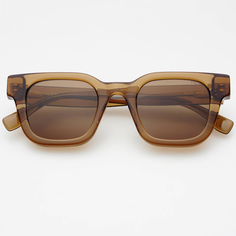 Brown sunglasses with a gradient effect on a white background