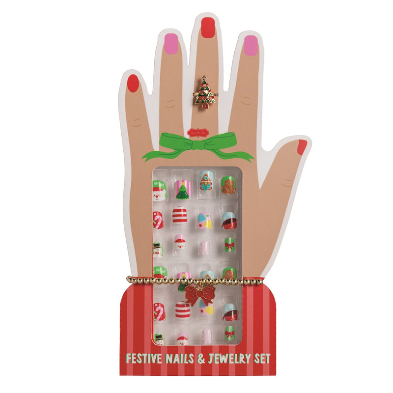 Festive nails and jewelry set in a hand-shaped display box on a white background