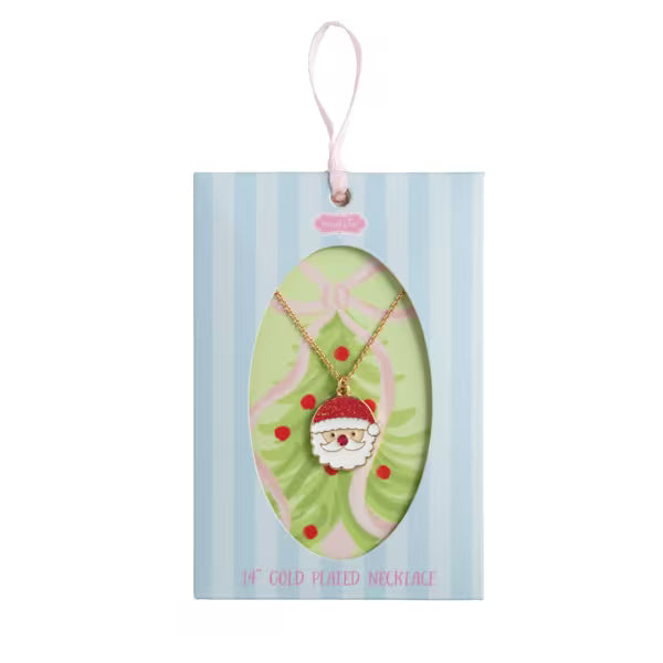 Necklace with a Santa Claus pendant on a decorative card with a pink background