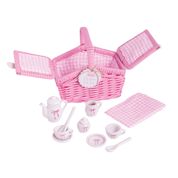 A pink and white gingham picnic basket playset with a woven pink basket, matching picnic cloth, teapot, cups, saucers, spoon, and small container, all arranged on a white background.