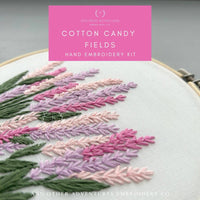 Hand embroidery kit with embroidered lavender design on a gray background, featuring 'Cotton Candy Fields' by And Other Adventures Embroidery Co.
