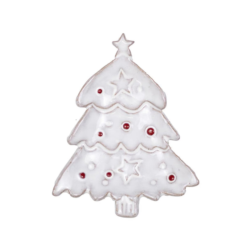 A white enamel Christmas tree charm with red enamel dots and star details, isolated on a white background.
