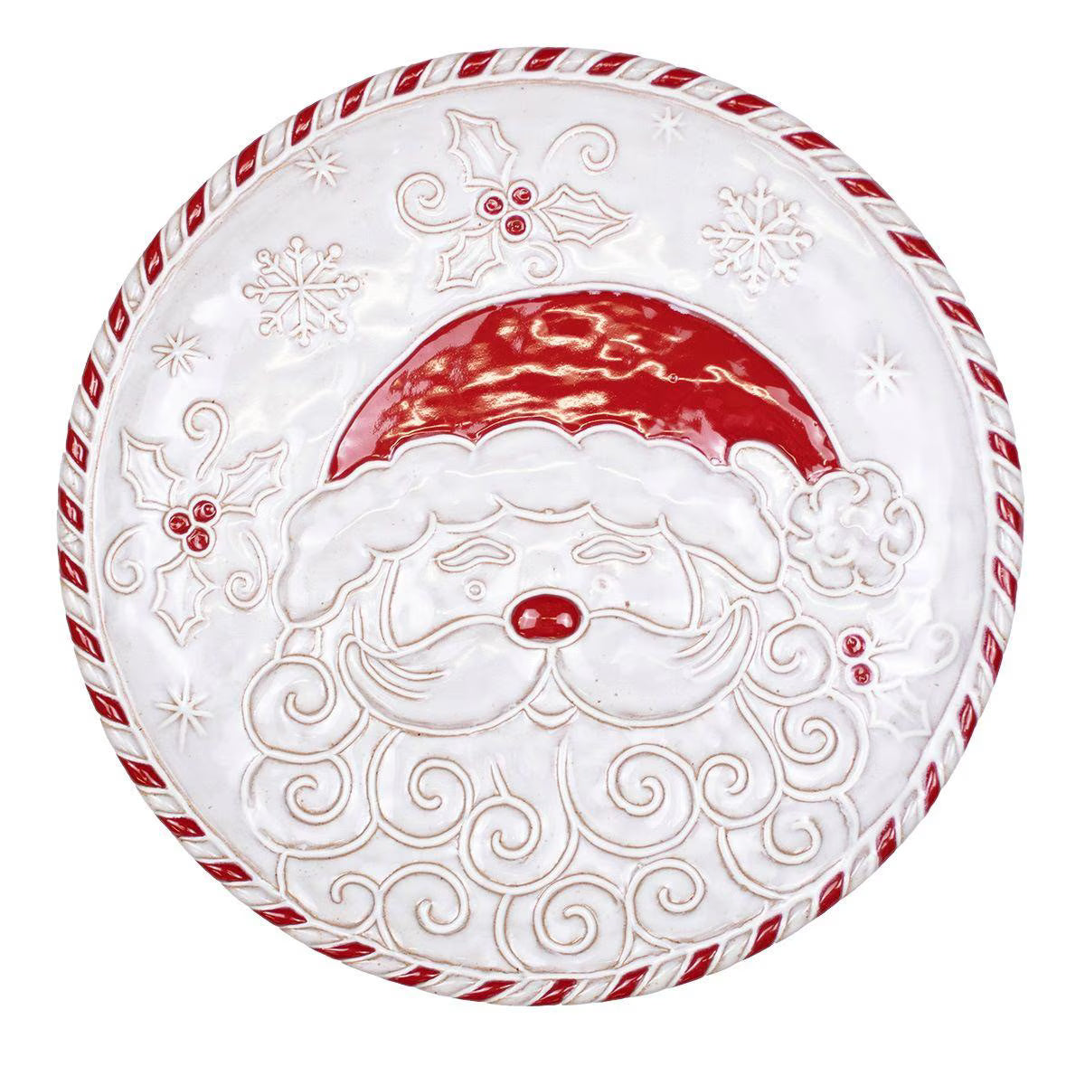 A round white ceramic Christmas plate featuring an embossed Santa Claus face with a glossy red hat and nose, surrounded by embossed snowflakes, holly leaves, and a red-and-white striped rope border.