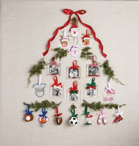 Collection of ornaments in the shape of Christmas tree on a white background
