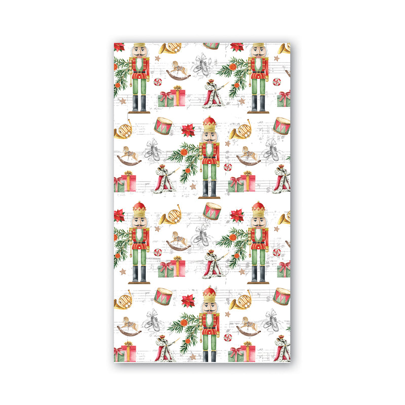 A rectangular napkin featuring a festive Christmas nutcracker pattern on a white background, surrounded by a clean white border.