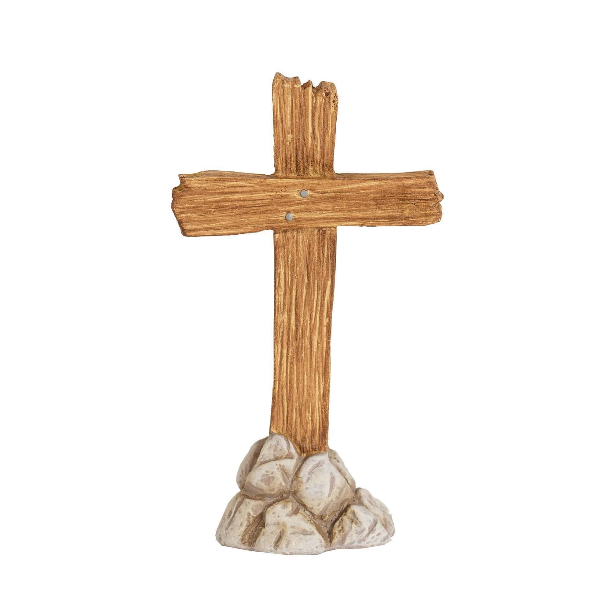 Wooden cross on a stone base against a white background