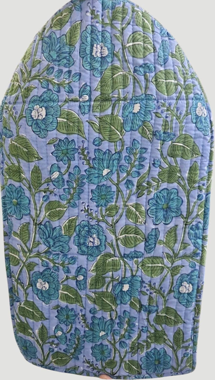 Floral-patterned ironing board cover with blue and green colors on a white background