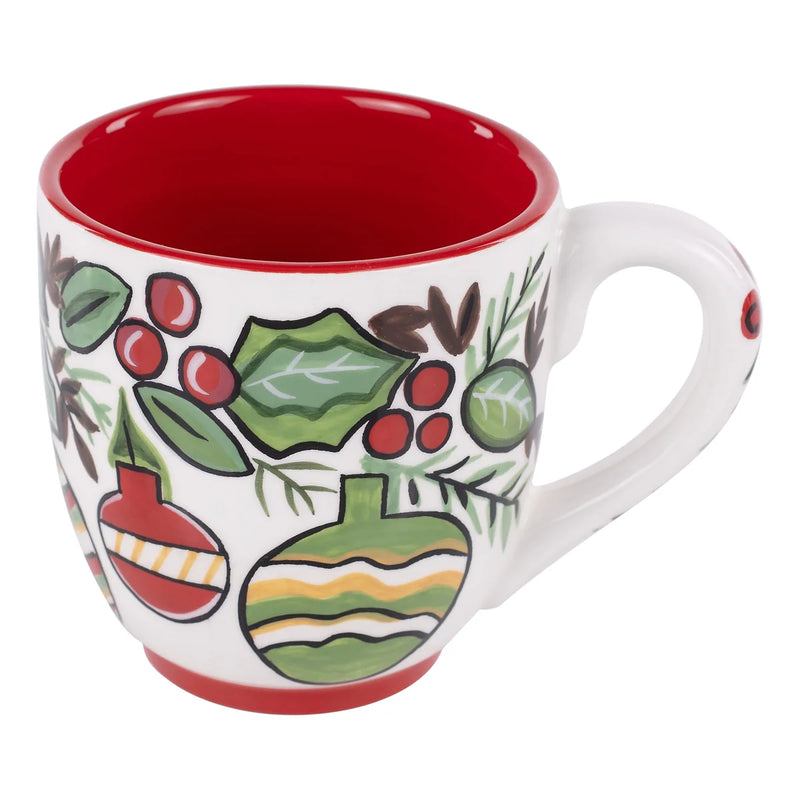 Decorative mug with Christmas-themed design on a white background