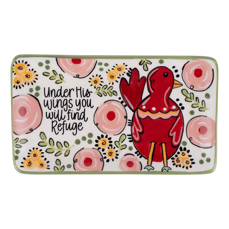 Decorative plate with a red bird illustration and floral design on a white background