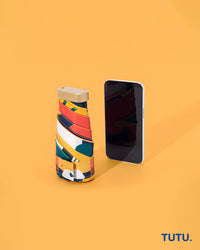 Colorful phone case with a smartphone on an orange background, featuring the brand 'TUTU'.
