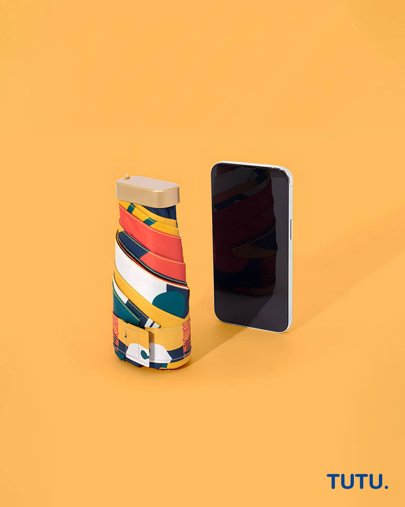 Colorful phone case with a smartphone on an orange background, featuring the brand 'TUTU'.