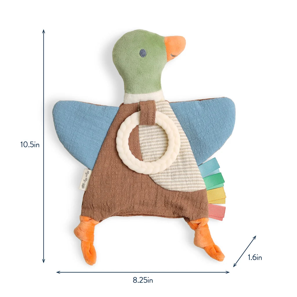 A plush duck sensory toy with a green head, blue wings, brown body, orange beak and feet, and a cream ring handle, shown on a white background with dimension arrows and labels.