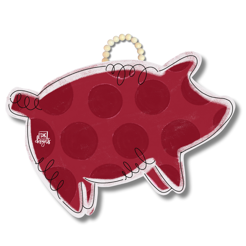 Red pig-shaped object with a white outline on a white background