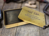 Gold leather wallet with 'ZEP-PRO' branding on a wooden surface