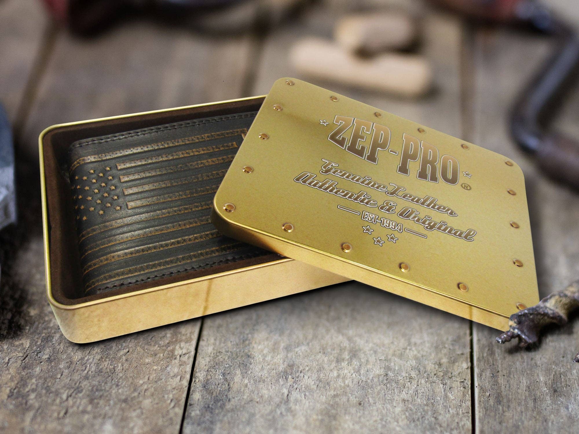 Gold leather wallet with 'ZEP-PRO' branding on a wooden surface
