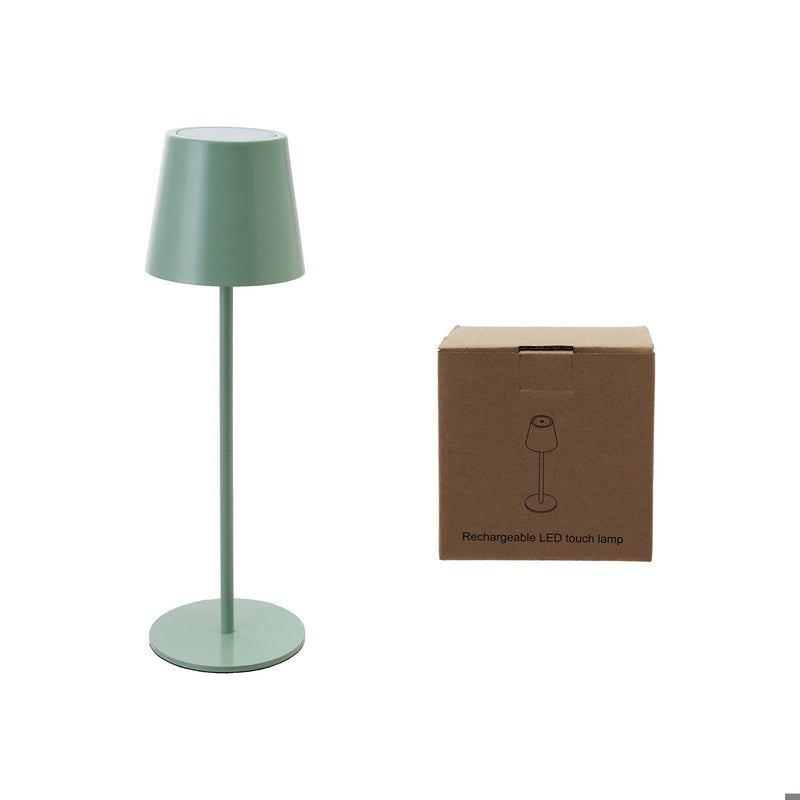 Green table lamp with packaging box on a white background