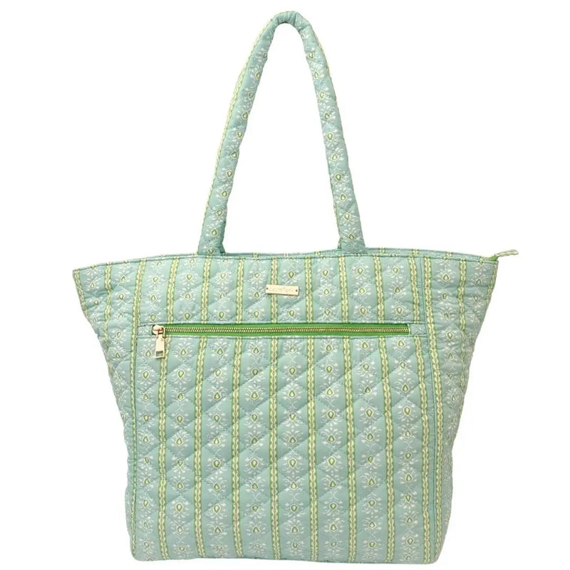 Light blue quilted tote bag with green accents on a white background
