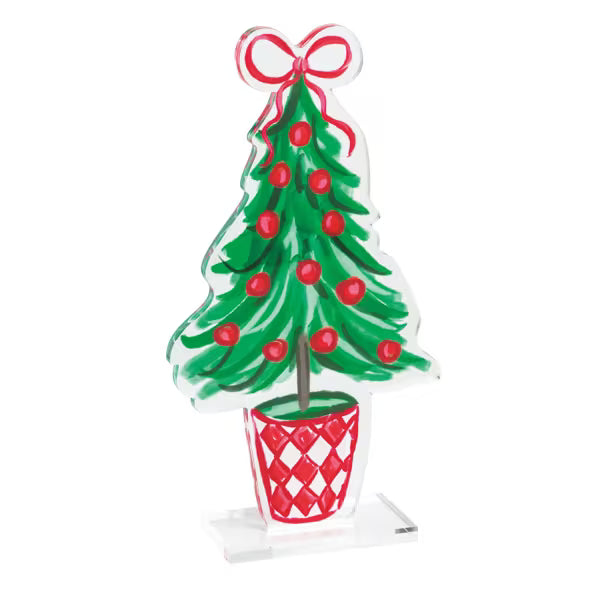 A hand-painted acrylic Christmas tree centerpiece in a pot, featuring green brushstroke tree branches with red ornaments and a red bow, set on a clear acrylic base against a white background.