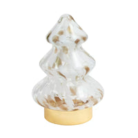 A clear glass Christmas tree-shaped ornament with gold and white marbled swirls, resting on a round gold-colored base against a solid white background.