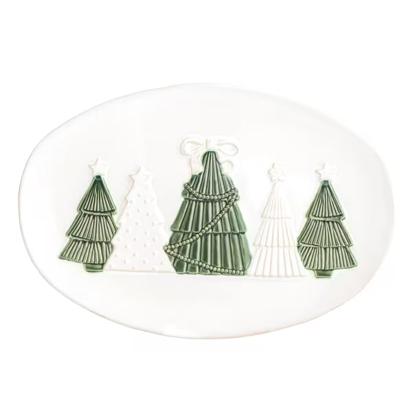 Three green tree-shaped earrings on a white oval background