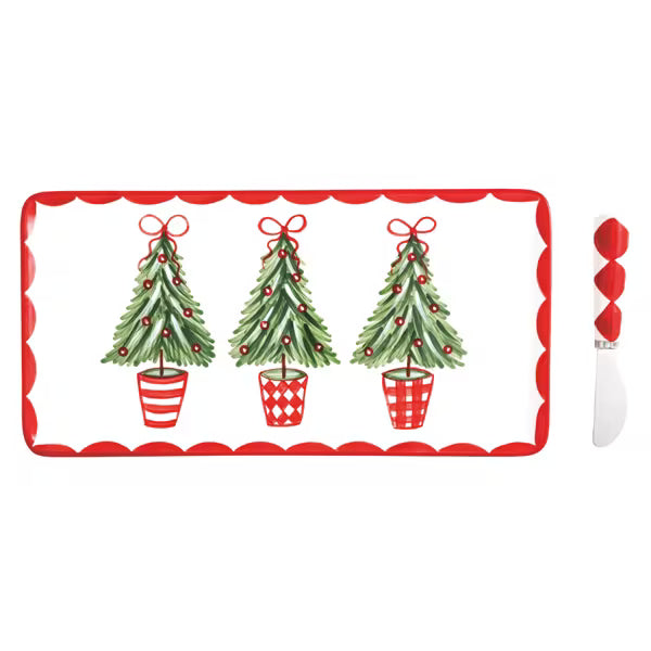 Rectangular placemat with Christmas tree design and a matching knife on a white background