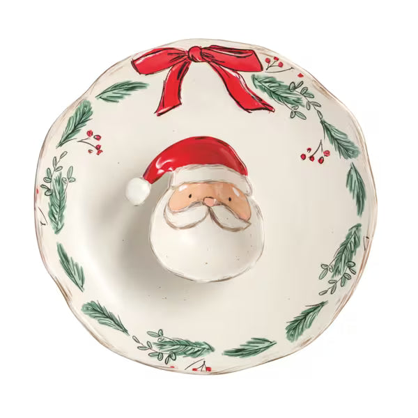 Decorative plate with a Santa Claus face and red bow on a white background