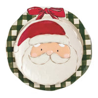 Decorative plate with a Santa Claus face and plaid border
