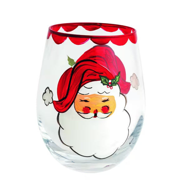 A clear stemless wine glass decorated with a hand-painted cartoon Santa Claus face, featuring a red hat, white beard, and a red scalloped rim.