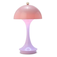 Pink and purple table lamp on a white background