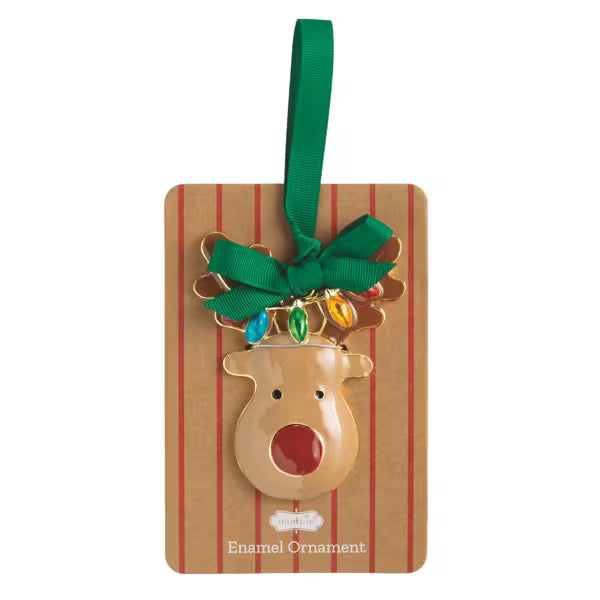 A Christmas enamel ornament shaped like a reindeer head with gold-tone antlers, a green ribbon loop, and colorful jewel-like lights, attached to a brown striped backing card labeled Enamel Ornament.