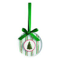 A round white Christmas ornament with green and red vertical stripes, a small green Christmas tree illustration in the center, and a bright green ribbon loop at the top.