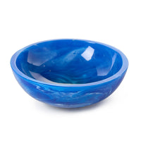 Blue glass bowl on a white background