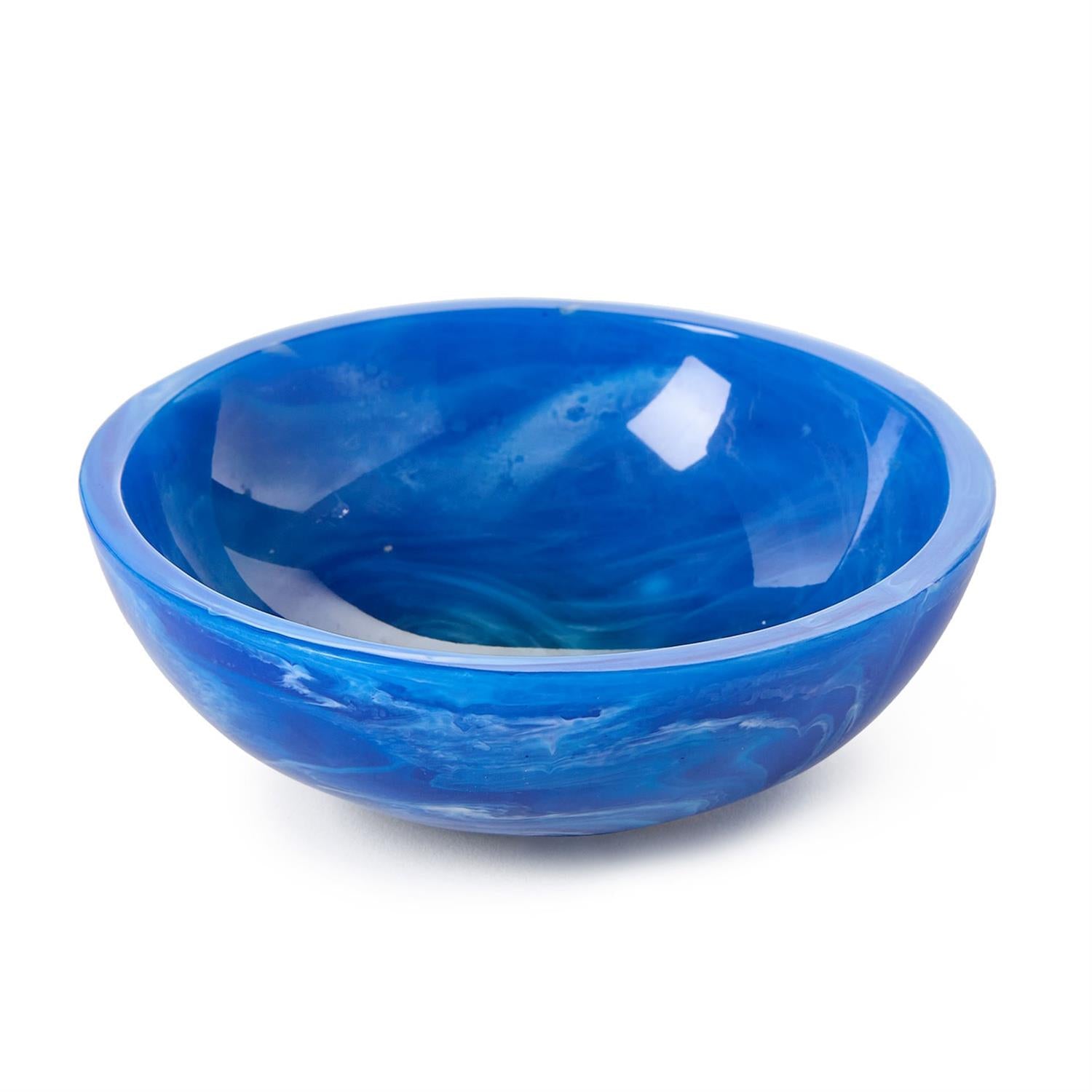 Blue glass bowl on a white background