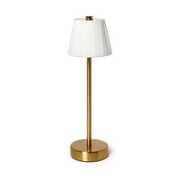 Gold floor lamp with a white shade on a white background