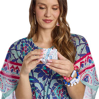 Woman holding a deck of cards with colorful jewelry on a white background