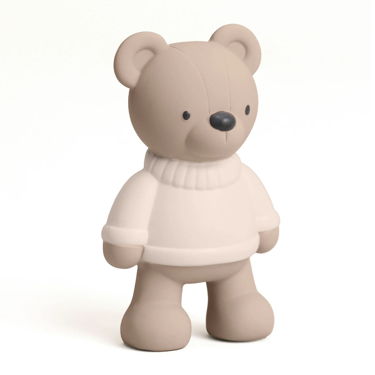 Teddy bear teether toy on a beige background.