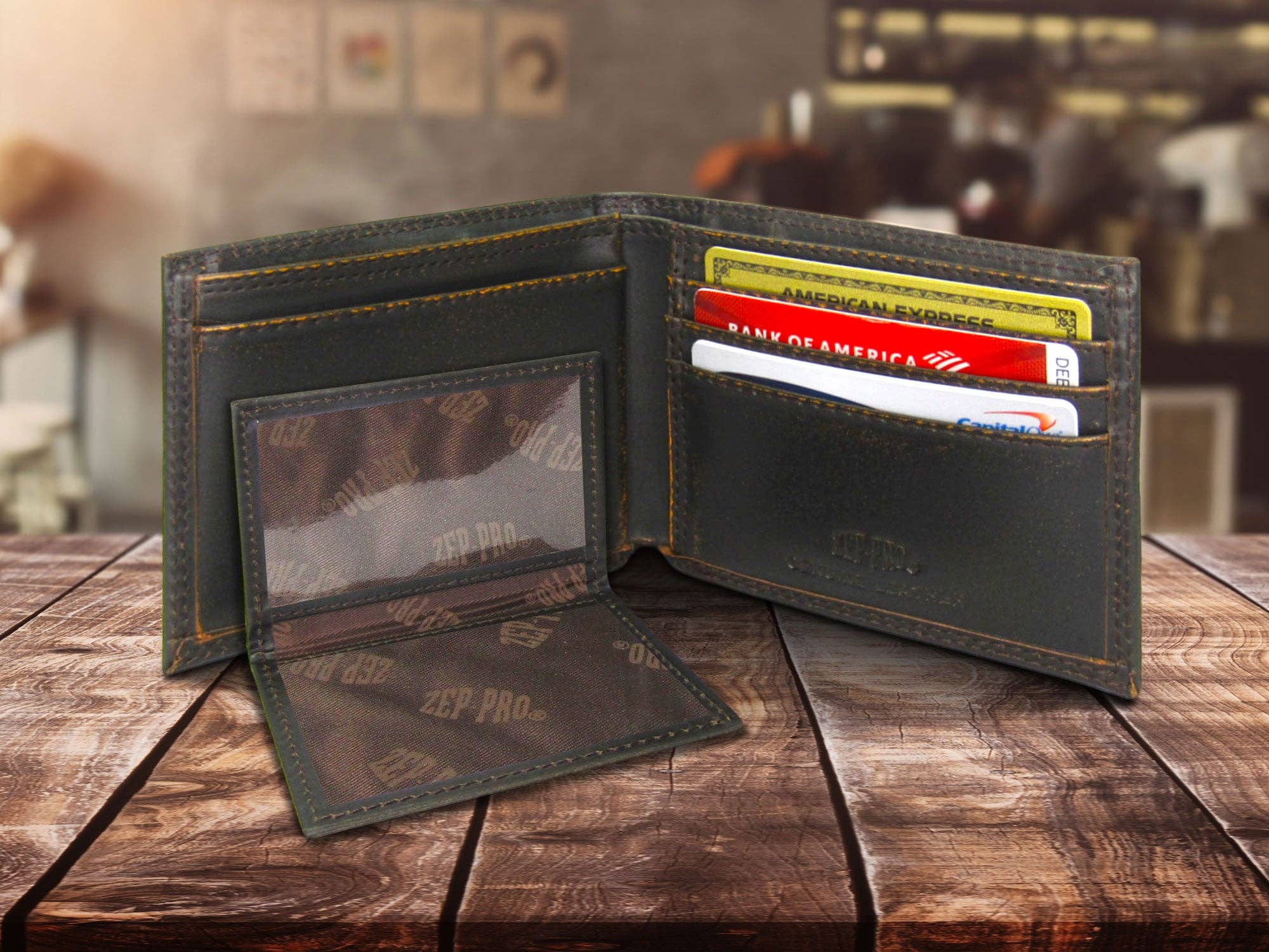 Open leather wallet with cards on a wooden surface
