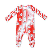 A baby footed sleeper with long sleeves and legs, featuring a red and white vertical stripe pattern with a repeating print of white cartoon dog faces wearing red Santa hats.