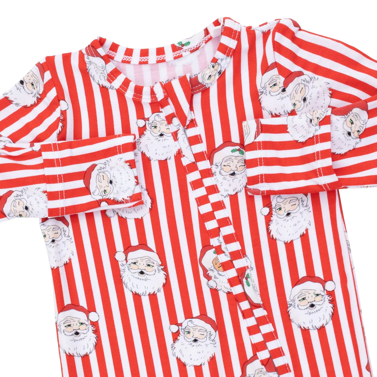 Red and white striped pajama set with Santa Claus pattern on a white background