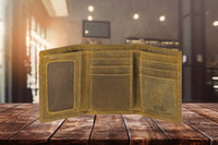 Open brown leather wallet on a wooden surface with a blurred indoor background
