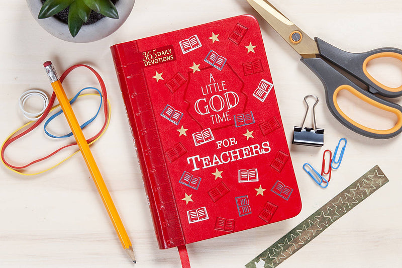 Red notebook titled 'A Little God Time for Teachers' with stationery items on a white background