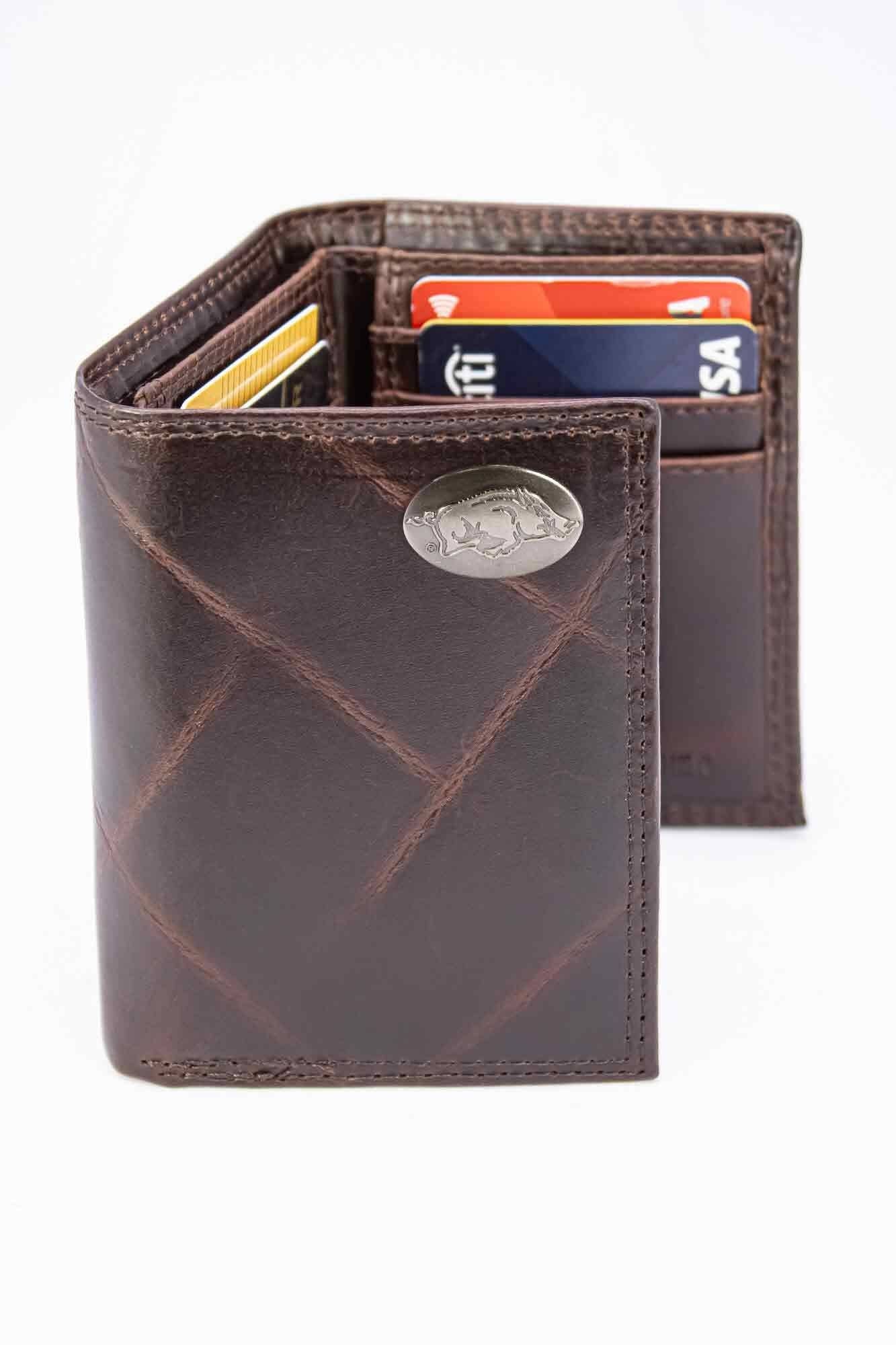 Brown leather wallet with card slots on a white background