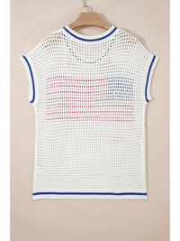 White crochet top with blue and red accents on a beige background