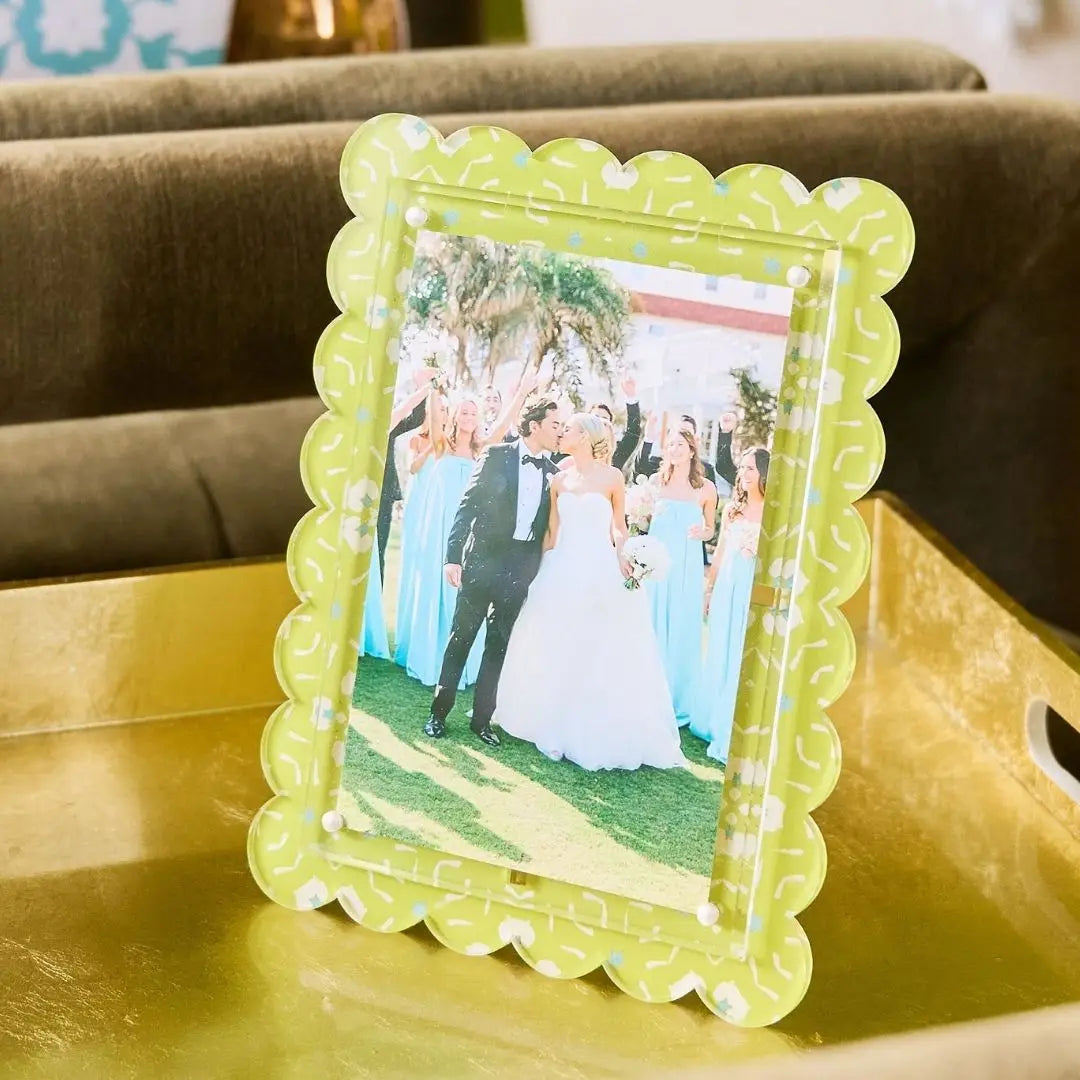 Wedding photo in a decorative frame on a table