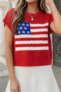 Person wearing a red crochet top with an American flag design.