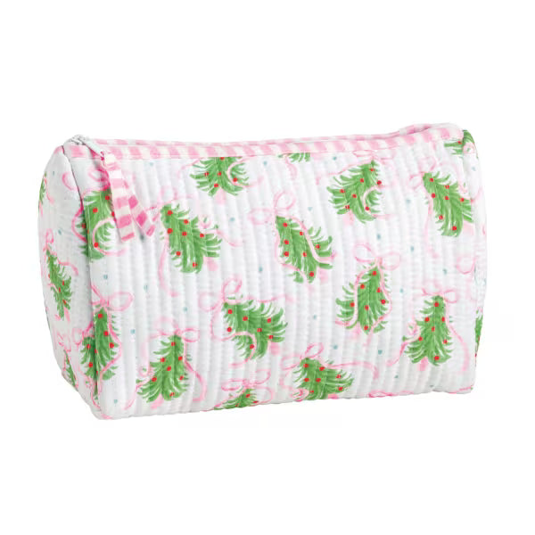 A quilted fabric cosmetic pouch with a white background, featuring a pattern of green Christmas trees, pink bows, and pink stripes along the top edge.