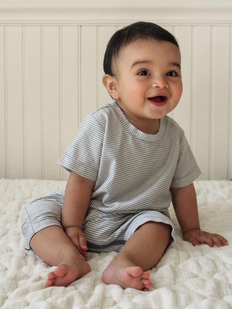 Child wearing Blue Stripe Short Sleeved Outfit