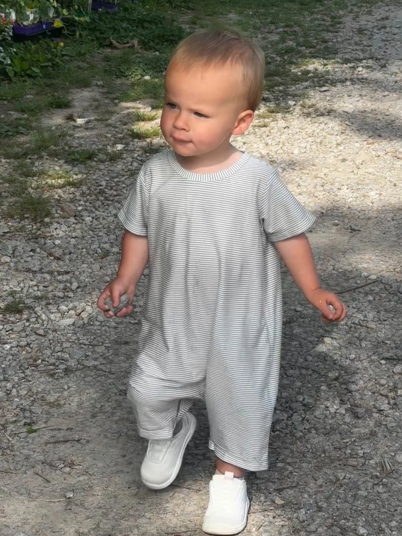 Child wearing Blue Stripe Short Sleeved Outfit