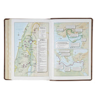 Open book with maps and text on a white background